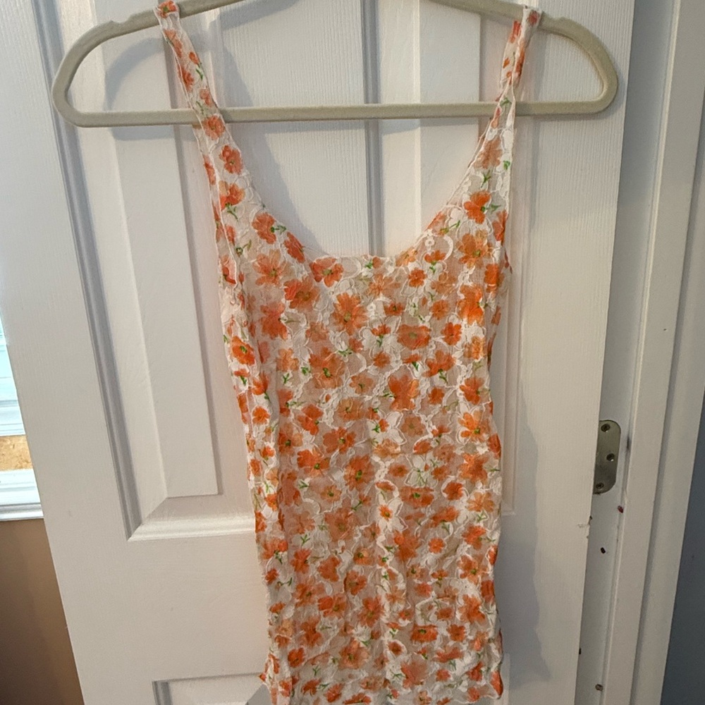 Free People Floral Tank Top with Orange and Green Accents. Lace detail.
